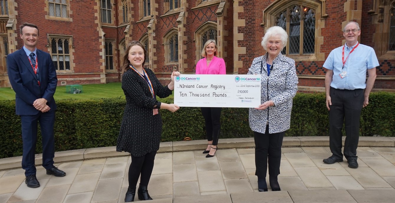 OGCancerNI present cheque for £10000 to NI Cancer Registry